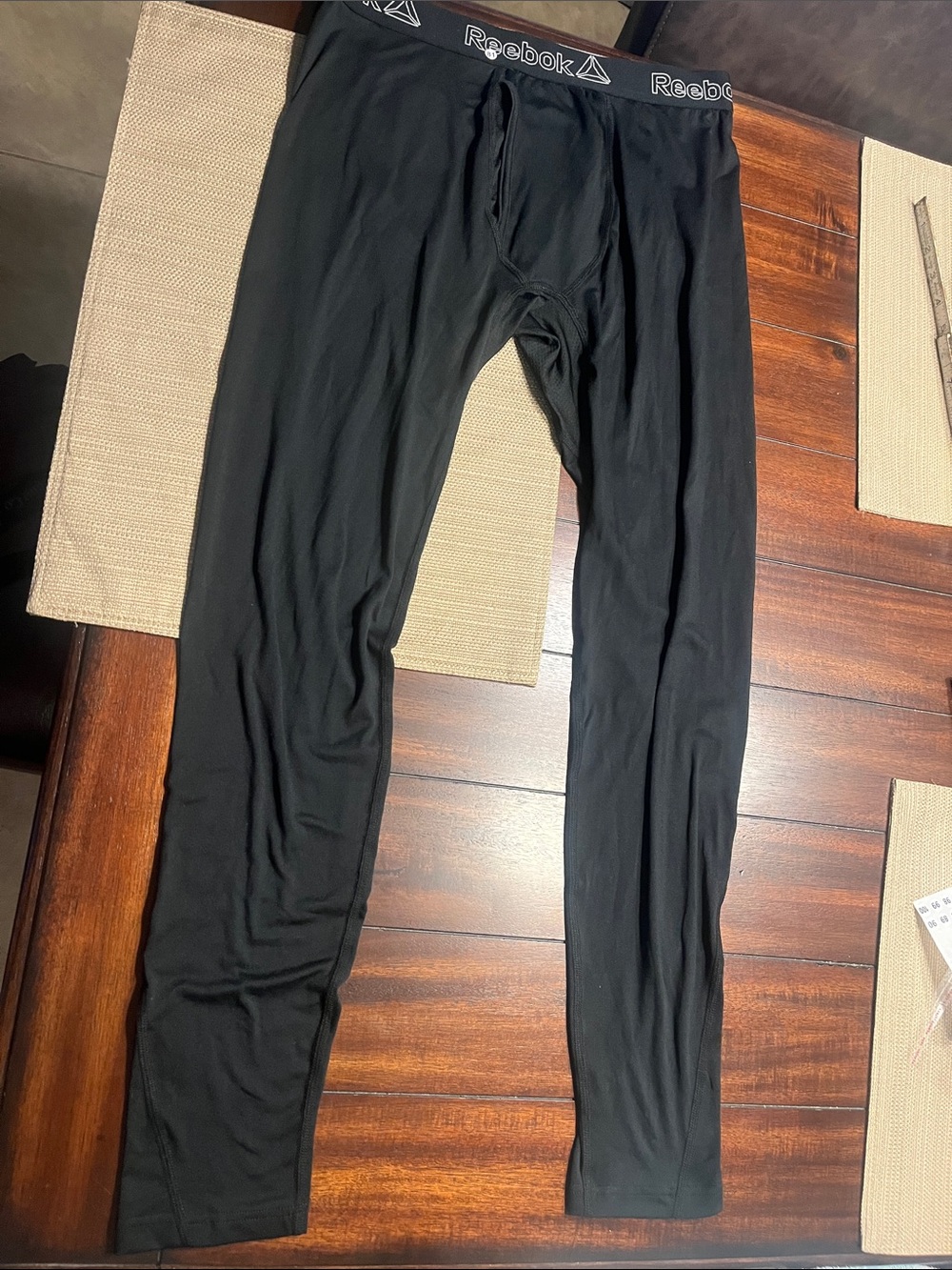 Item 81’.  Reebok Black Men's Compression Base Layer Tights long John’s large